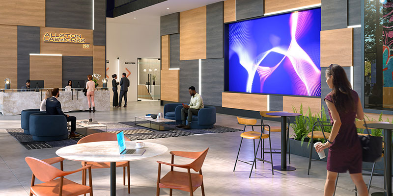 Lobby and seating area with large wall-mounted screen